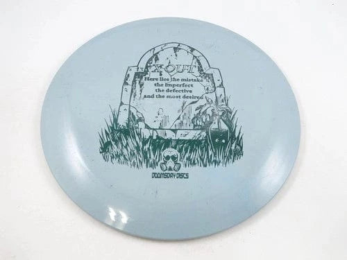 Light blue disc with tombstone graphic.