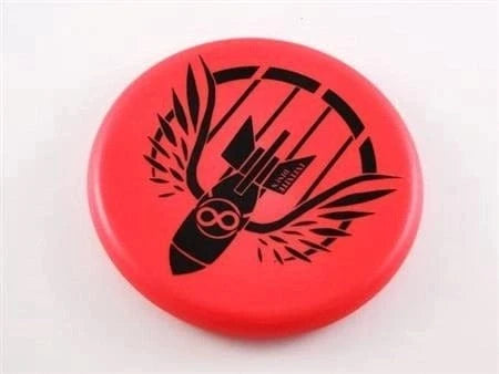 Red disc with black winged bomb graphic.