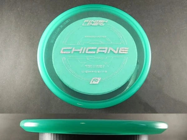 Green disc golf disc, top and side view.