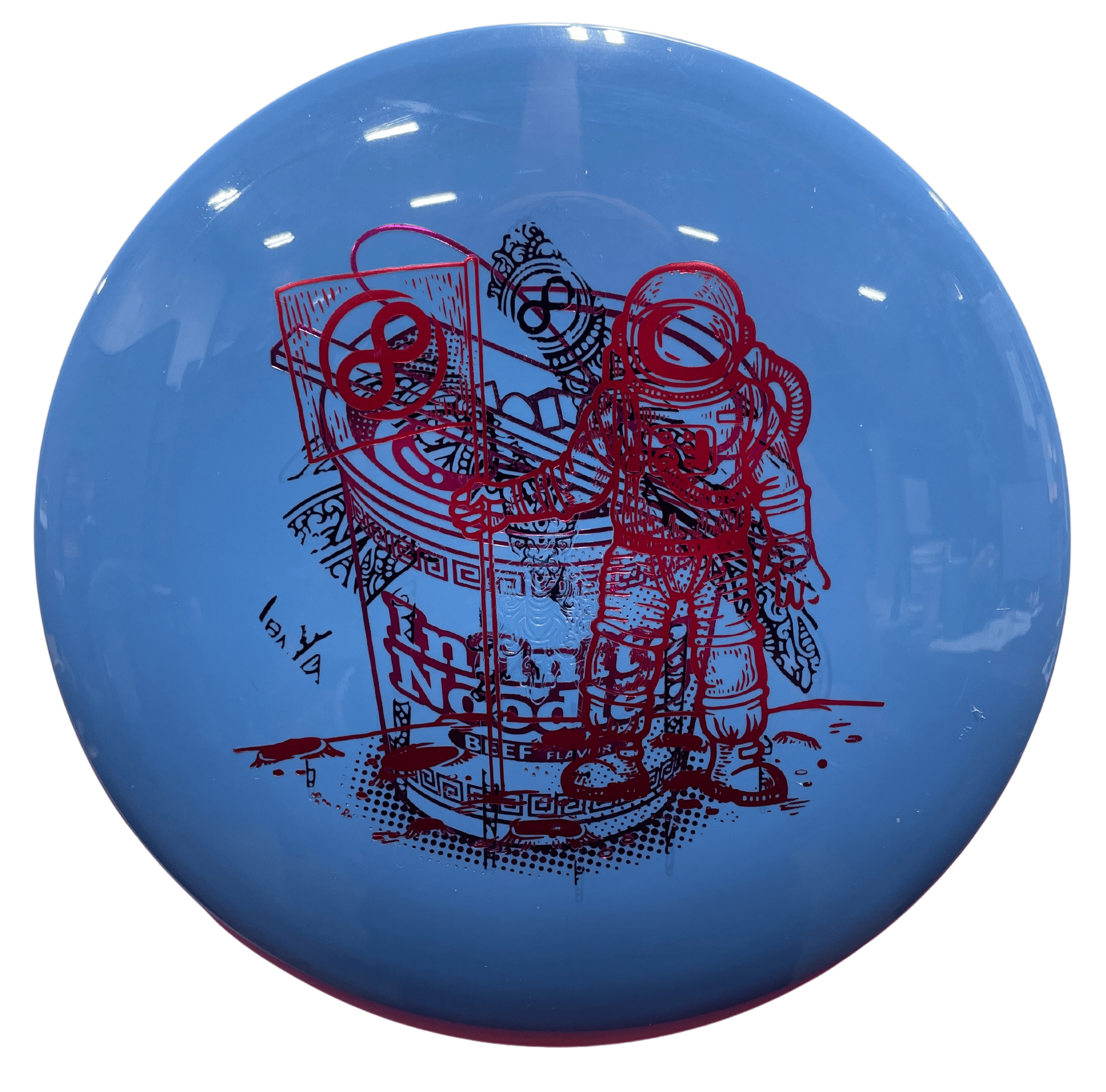 I-Blend X-Out disc golf disc with astronaut graphic.
