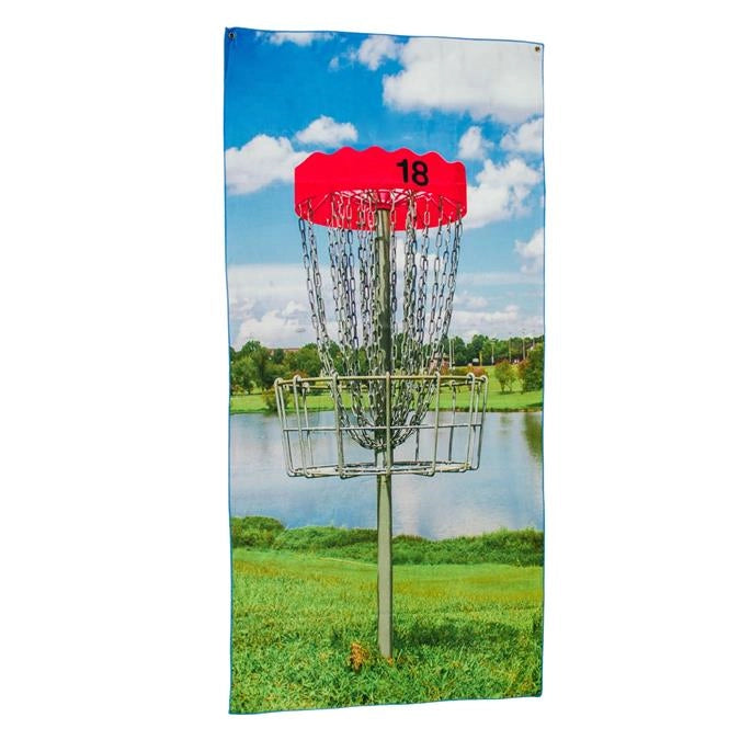 Disc golf towel with basket and scenic background