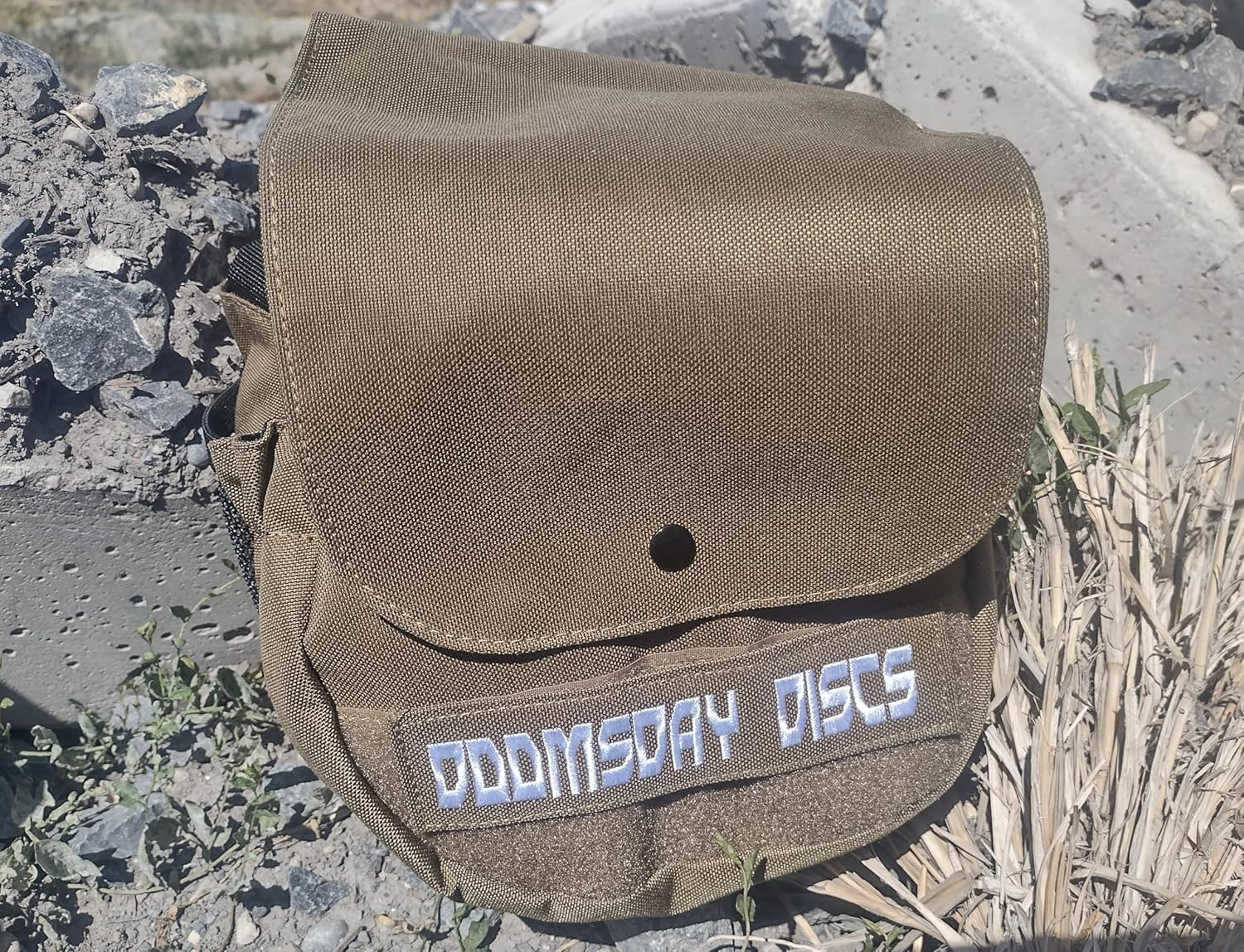 Military green canteen bag with DOOMSDAY DISCS label