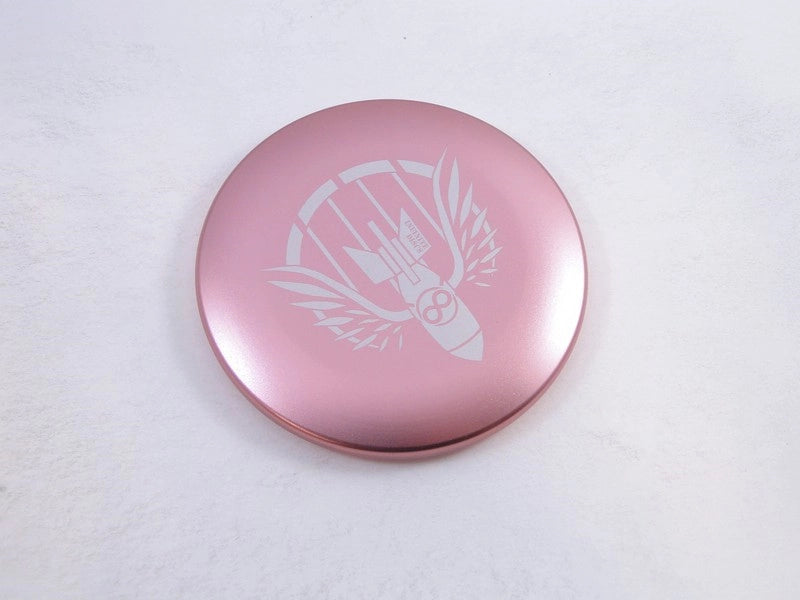 Pink round compact with engraved logo