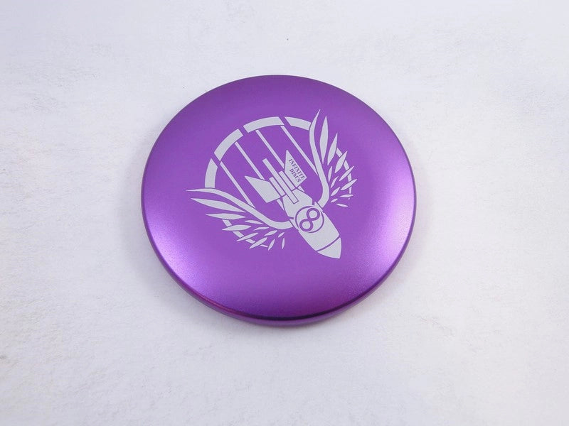 Purple disc with bomb logo