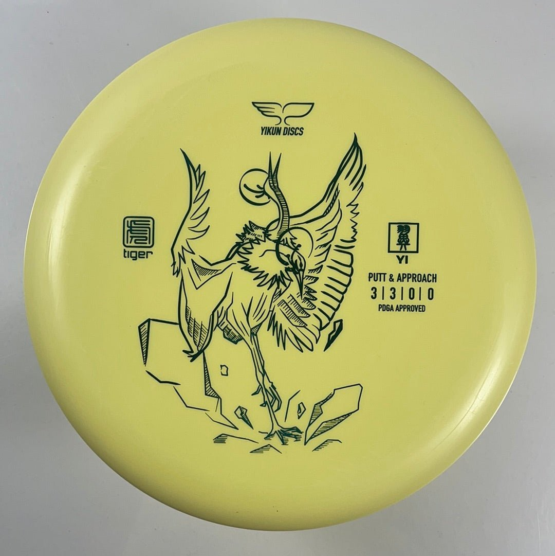 Yellow Yi Tiger disc golf disc